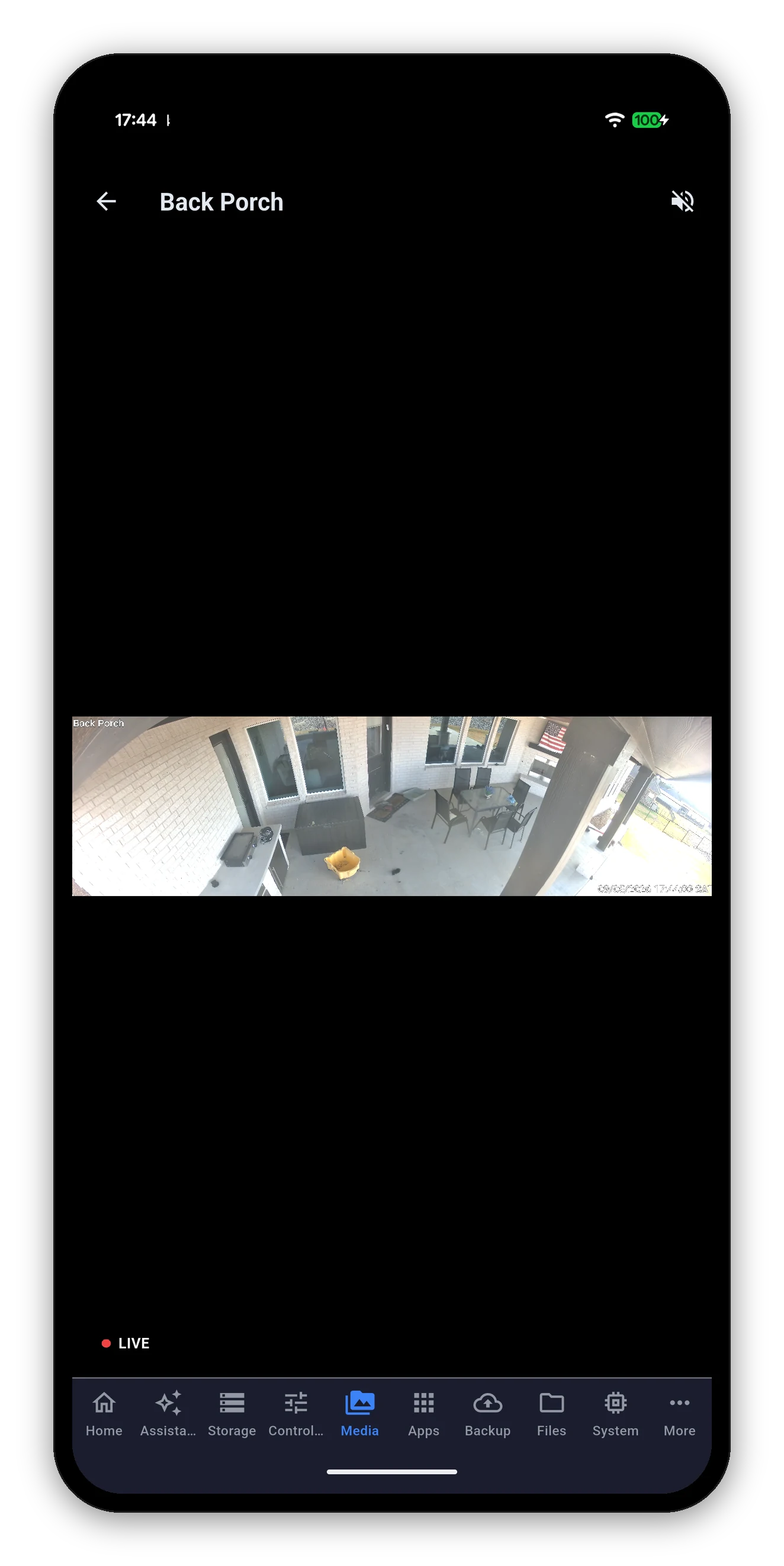 Full-screen Surveillance Station live view with the LIVE indicator and mute control